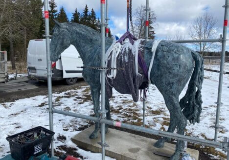 How do I place a bronze sculpture outdoors?